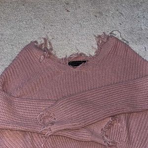 Cropped pink sweater with fringe